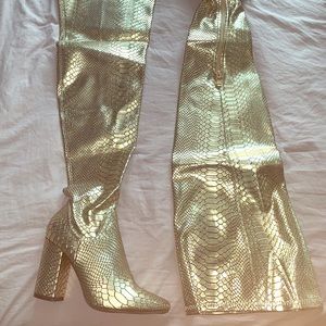 Thigh high snakeskin boot